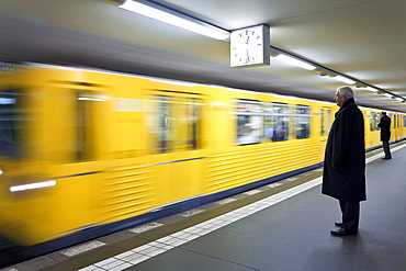 Moving train pulling into modern subway station, Berlin, Germany, Europe