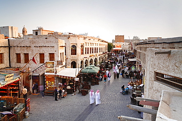 The restored Souq Waqif with mud rendered shops and exposed timber beams, Doha, Qatar, Middle East