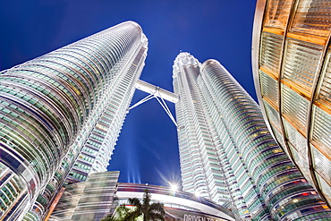 Low angle view of the Petronas Twin Towers, Kuala Lumpur, Malaysia, Southeast Asia, Asia