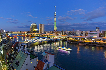 City skyline and Skytree on the Sumida River, Tokyo, Japan, Asia