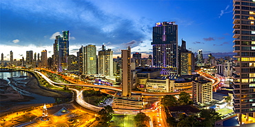 City skyline illuminated at dusk, Panama City, Panama, Central America