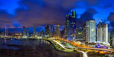 City skyline illuminated at dusk, Panama City, Panama, Central America