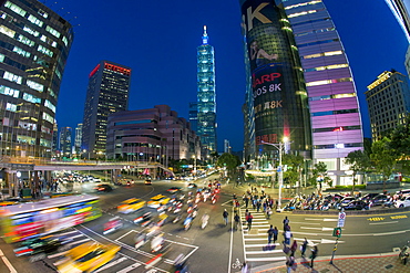 Traffic in front of Taipei 101 at a busy downtown intersection in the Xinyi district, Taipei, Taiwan, Asia