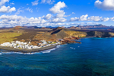 Aerial view of El Golfo village and the volcanic landscape of Timanfaya National Park, Lanzarote, Canary Islands, Spain, Atlantic, Europe