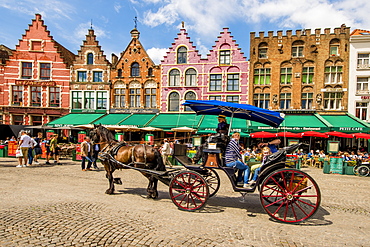 Horse drawn carriage in The Markt (Market Square), Bruges, UNESCO World Heritage Site, West Flanders, Belgium, Europe