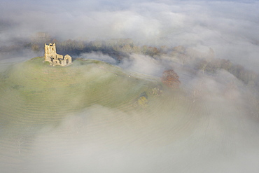 Aerial image of St Michael's Church on Burrow Mump, surrounded by a blanket of mist, Burrowbridge, Somerset, England, United Kingdom, Europe