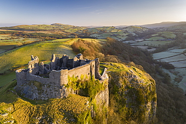 Aerial vista by drone of Carreg Cennen Castle, Brecon Beacons National Park, Carmarthenshire, Wales, United Kingdom, Europe