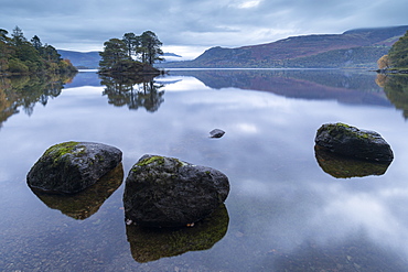 Reflective Derwent Water at dawn in the Lake District National Park, UNESCO World Heritage Site, Cumbria, England, United Kingdom, Europe