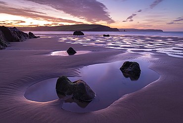 Tidal Pools on Bigbury beach at dawn, Bigbury-on-Sea, South Hams, Devon, England, United Kingdom, Europe