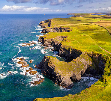 Aerial vista of Porthmissen Bridge and dramatic coastline near Trevone, Cornwall, England, United Kingdom, Europe