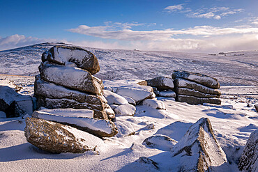 Snow covered granite outcrops on Great Staple Tor, Dartmoor National Park, Devon, England, United Kingdom, Europe