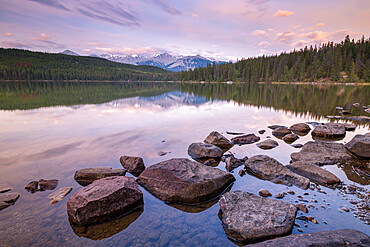 Sunrise on a beautiful reflective lake in the Canadian Rockies, Jasper National Park, UNESCO World Heritage Site, Alberta, Canada, North America