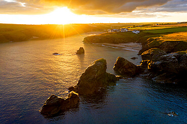 Summer sunrise over Porthcothan Bay on the North Cornwall coast, Cornwall, England, United Kingdom, Europe