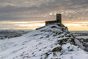 Brentor Church on a snowy outcrop on a winter morning, Dartmoor, Devon, England, United Kingdom, Europe