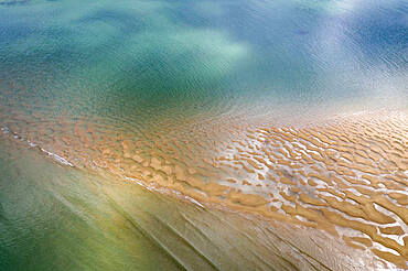 Aerial photograph of the Doom Bar emerging from the Camel Estuary at low tide in spring, Padstow, Cornwall, England, United Kingdom, Europe