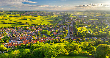 Aerial view of Glastonbury on a sunny summer evening, Somerset, England, United Kingdom, Europe