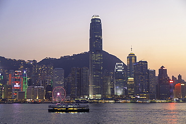 Star Ferry in Victoria Harbour at dusk, Hong Kong Island, Hong Kong, China, Asia