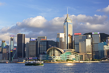 Star Ferry in Victoria Harbour with skyscrapers of Wan Chai, Hong Kong, China, Asia