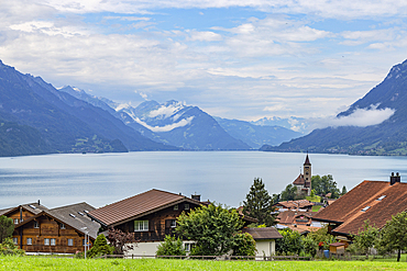 Reformed Church and chalets, Lake Brienz, Brienz, Bernese Oberland, Switzerland