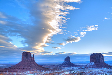 Sunrise, West Mitten Butte on left, East Mitten Butte in centre and Merrick Butte on right, Monument Valley Navajo Tribal Park, Utah, United States of America, North America