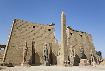 Six Colossi of Ramses II in front of Pylon, Obelisk, Luxor Temple, UNESCO World Heritage Site, Luxor, Thebes, Egypt, North Africa, Africa