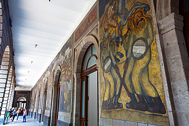 Group of tourists with guide, office doors with murals of Diego Rivera, Secretaria de Educacion Building, Mexico City, Mexico, North America