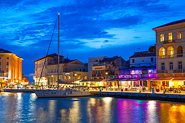 Boat and waterfront restaurants in the evening, Harbor, Porec, Croatia, Europe