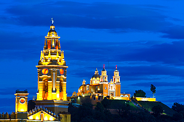 Evening, Convent of San Gabriel Arcangel in the foreground, Church de Nuestra Senora de los Remedios in the background, Cholula, Puebla State, Mexico, North America