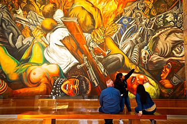 Guide with Tourists viewing Frescoe by Jose Clemente Orozco, Palacio de Bellas Artes (Palace of Fine Arts), Mexico City, Mexico, North America