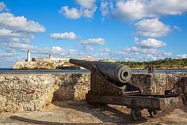 Centuries Old Cannon, Castillo Del San Salvador (foreground), Castillo Morro (background), Havana Old Town, Havana, Cuba