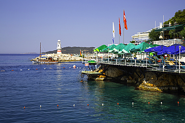 Kucuk Cakil Beach, Marina Lighthouse with Tour Boat (background), Kas, Antalya, Turkey