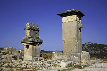 Lycian Pillar Tomb (left) & Harpy Monument, Xanthos Archaeological Site, Originally Founded 8th Century BC, UNESCO World Heritage Site, Near Kalkan, Antalya, Turkey