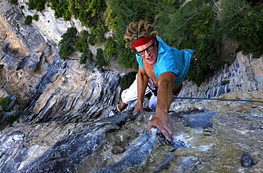 A man on a very long and overhanging climb on the famous limestone cliffs of the Mascun Canyon, Rodellar, Sierra de Guara, Aragon, southern Pyrenees, Spain, Europe