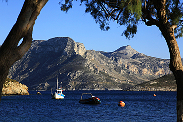 Greek fishing boat at anchor, Kalymnos, Dodecanese, Greek Islands, Greece, Europe