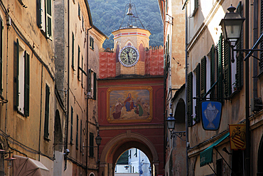 Narrow street in the old town of Finale, Liguria, Italy, Europe