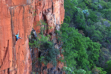 A climber on the sandstone cliffs of Waterval Boven, South Africa, Africa