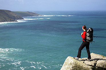 A woman hiking at Bosigran, Cornwall, England, United Kingdom, Europe