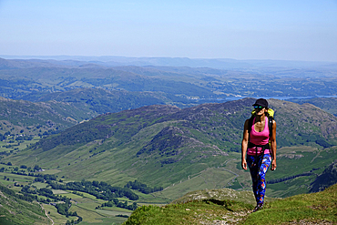 Hiker on a trail above Langdale, Lake District National Park, UNESCO World Heritage Site, Cumbria, England, United Kingdom, Europe