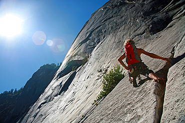 Rock climber in action in Yosemite Valley, California, United States of America, North America