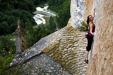 A climber on the cliffs known as the Tennessee Walls, high above the Tarn river and home to some of the most spectacular pitches of rock climbing in Europe, Gorges du Tarn, near Millau and Rodez, Cevennes region, south west France, Europe