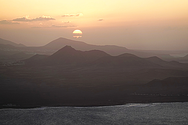 Sunset over the volcanic hills of Lanzarote, Canary Islands, Spain, Atlantic, Europe