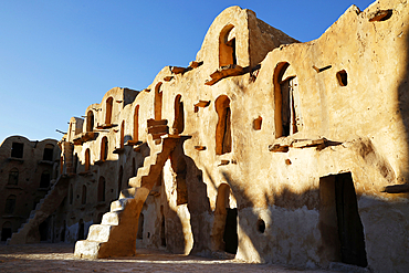 Ksar Ouled Soltane, a fortified granary, Tataouine district, southern Tunisia. The ksar is spread out over two courtyards, each of which has a perimeter of multi-story vaulted granary cellars, or ghorfas.