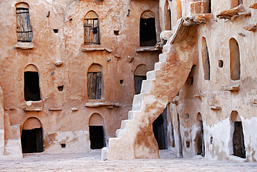 Ksar Ouled Soltane, a fortified granary, Tataouine district, southern Tunisia. The ksar is spread out over two courtyards, each of which has a perimeter of multi-story vaulted granary cellars, or ghorfas.