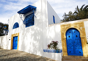 The strikingly situated clifftop town of Sidi Bou Said, north of Carthage, Tunisia, has a reputation as a town of artists.