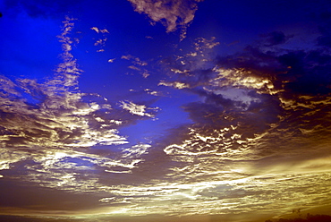 Colourful clouds at dusk, Kerala, India, Asia