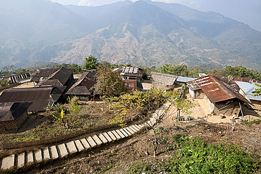 Recently constructed concrete steps to ease access between higher and lower sections of village on steep Naga hillside, Nagaland, India, Asia