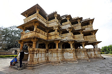 Couple entering the 12th century 150 pillar Dev Somnath temple, the world's only temple made just of stone, Dev, Rajasthan, India, Asia