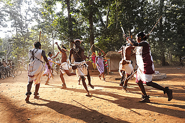 Dhurua tribal men and women performing rare traditional tribal dance to celebrate festival of Shivraatri, Gupteswar, Odisha, India, Asia