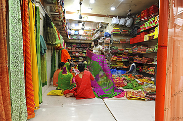 Women buying their new saris for Diwali festival celebrations, Mandvi, Gujarat, India, Asia