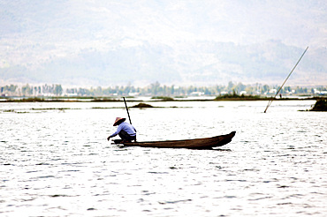 Fisherman on Loktak Lake, the largest freshwater lake in NE India, Moirang, Manipur, India, Asia